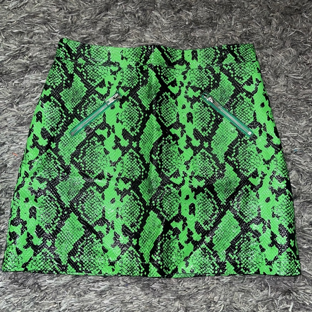 Green goblin snake skin mini skirt